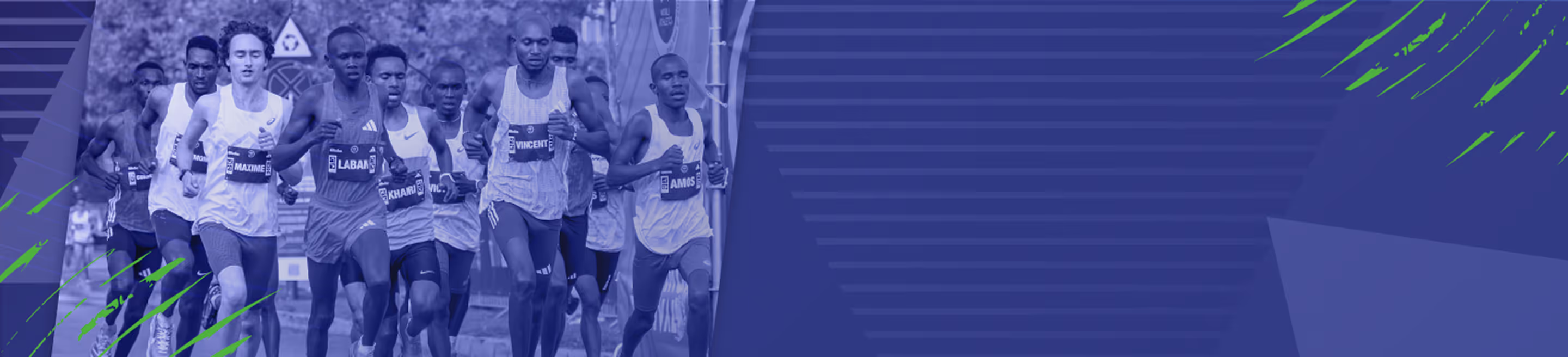 Group of male marathon runners competing in a race on a road.